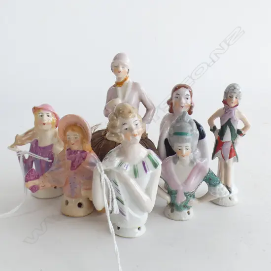 Seven Art Deco era half dolls.